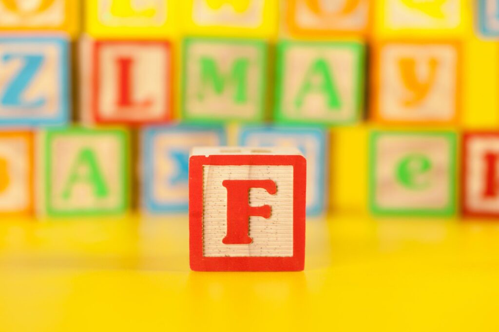 Photograph of colorful Wooden Block Letter F representing Medigap Plan F cover