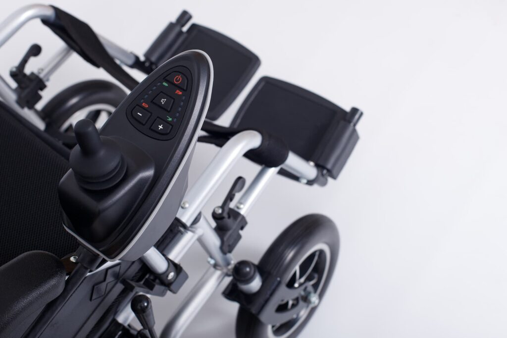 Motorized Electric wheelchair for senior elder patient who cannot walk. Contact Wise Insurance today.