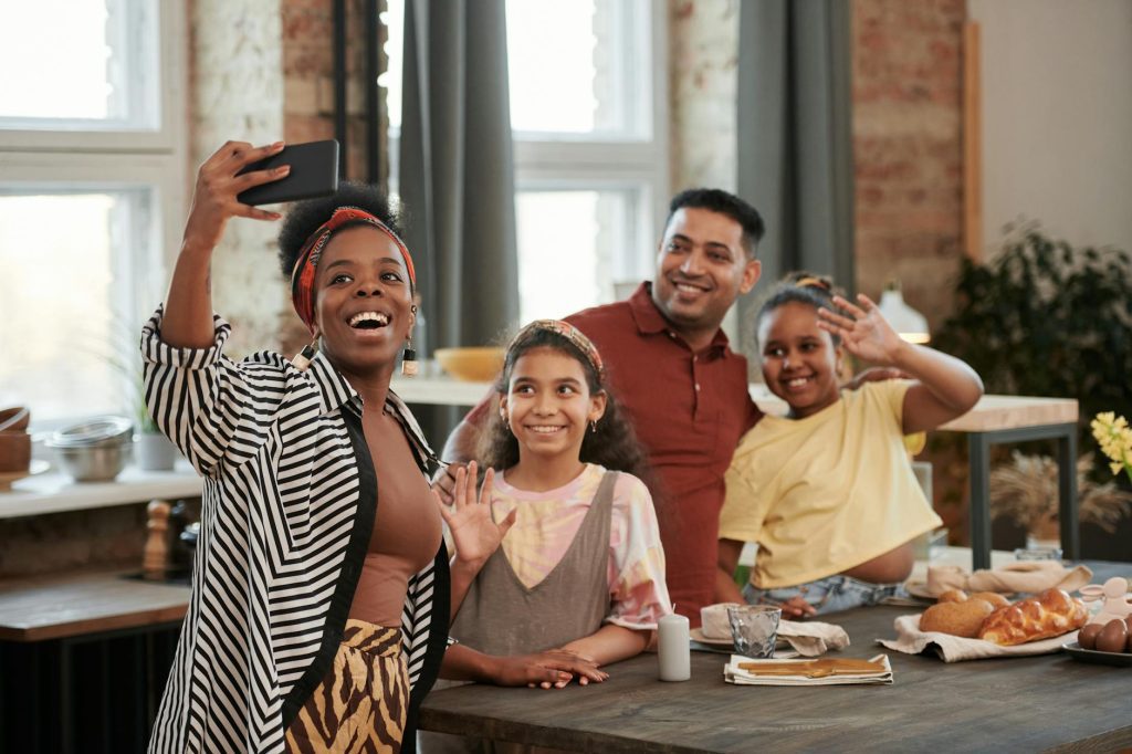 A Houston family comparing ACA Marketplace Silver and Bronze plan options at their kitchen table