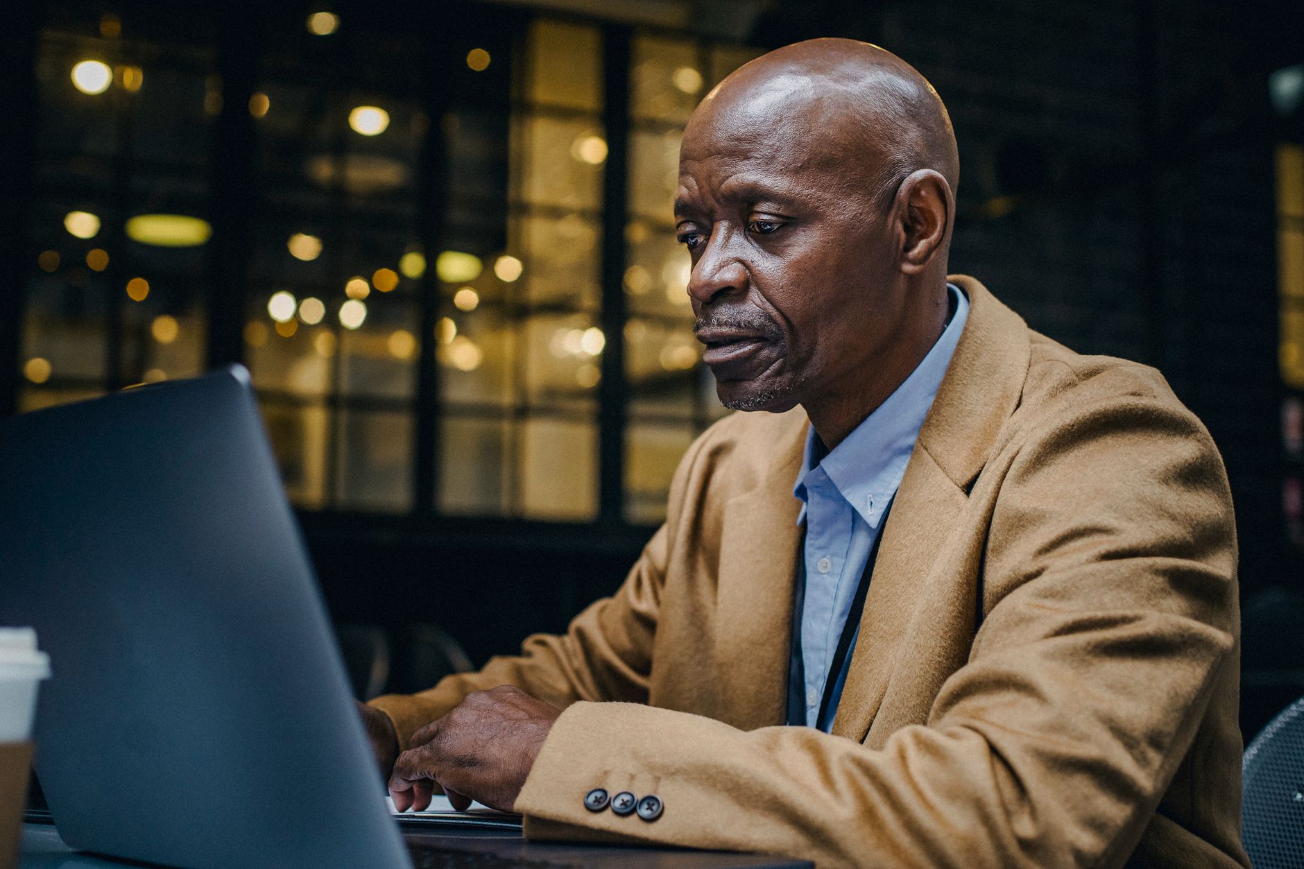 A Houston worker near 65 reviewing HSA and Medicare timing before retirement