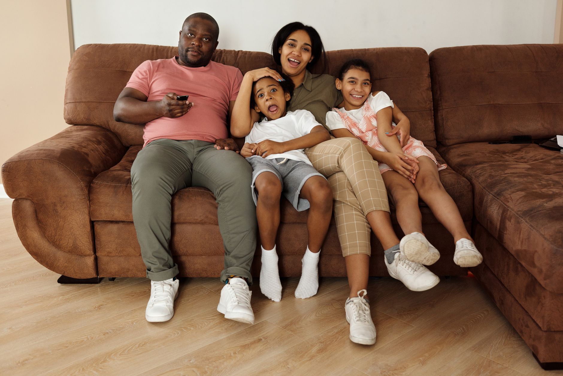 A Houston family weighing job-based coverage against a Marketplace plan after the family-glitch fix