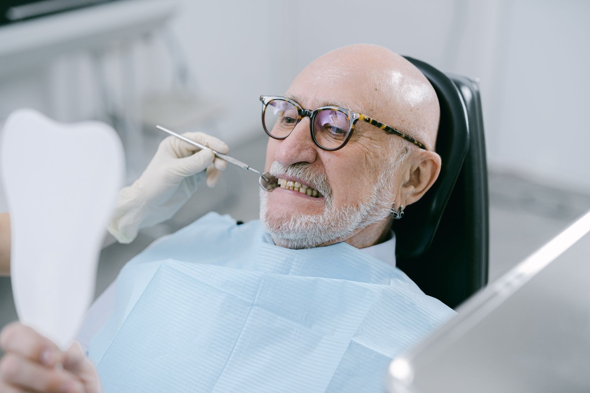 Houston Medicare Advantage member using dental, vision, and hearing benefits at a clinic