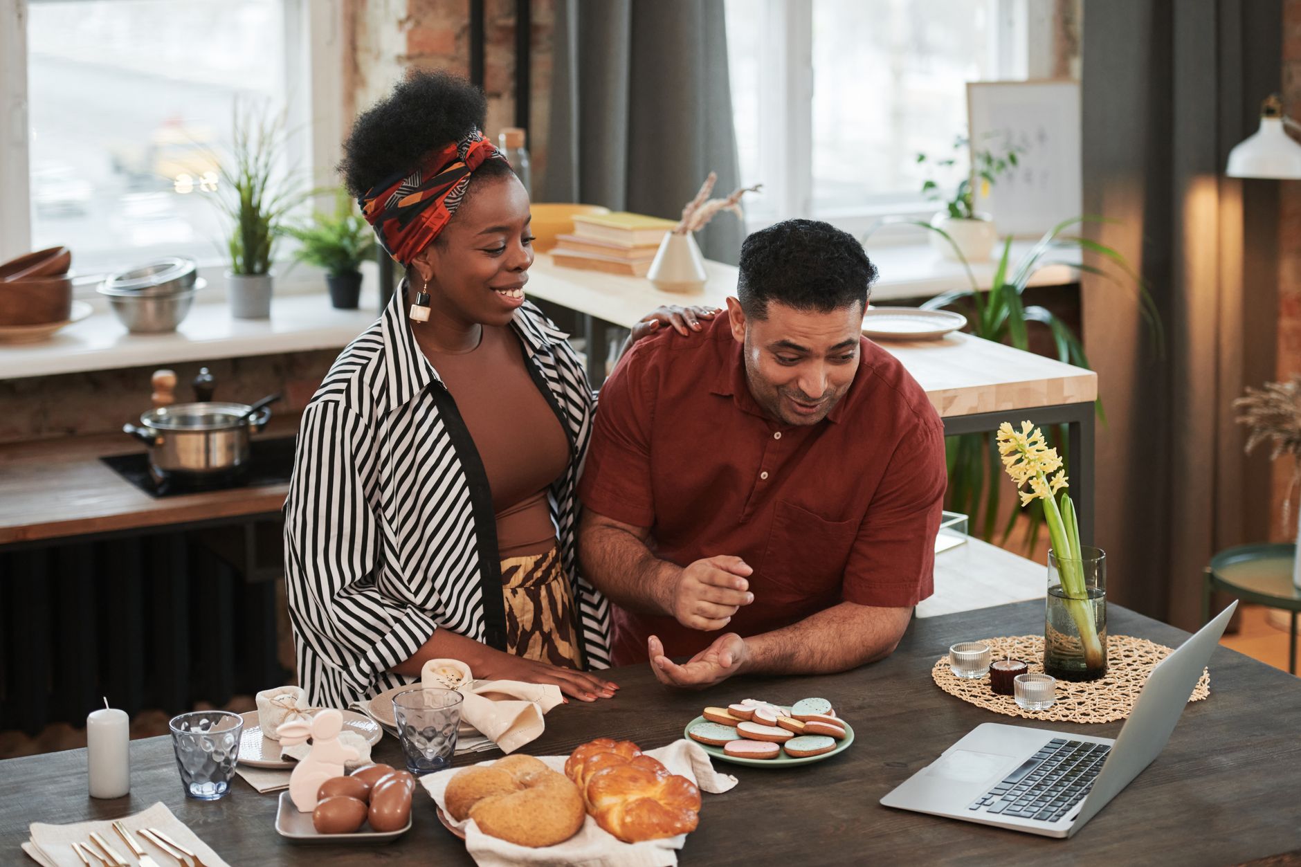 A Houston patient talks with a clinician who is holding a clipboard — the moment when whether your plan has a provider network starts to matter.