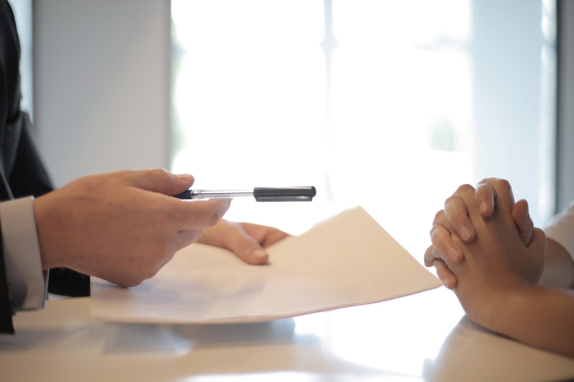Houston dialysis patient reviewing Medicare coverage paperwork and enrollment dates